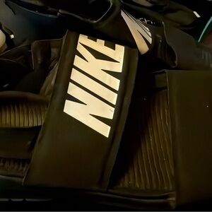 Nike Black Slide Sandals with White Logo Strap